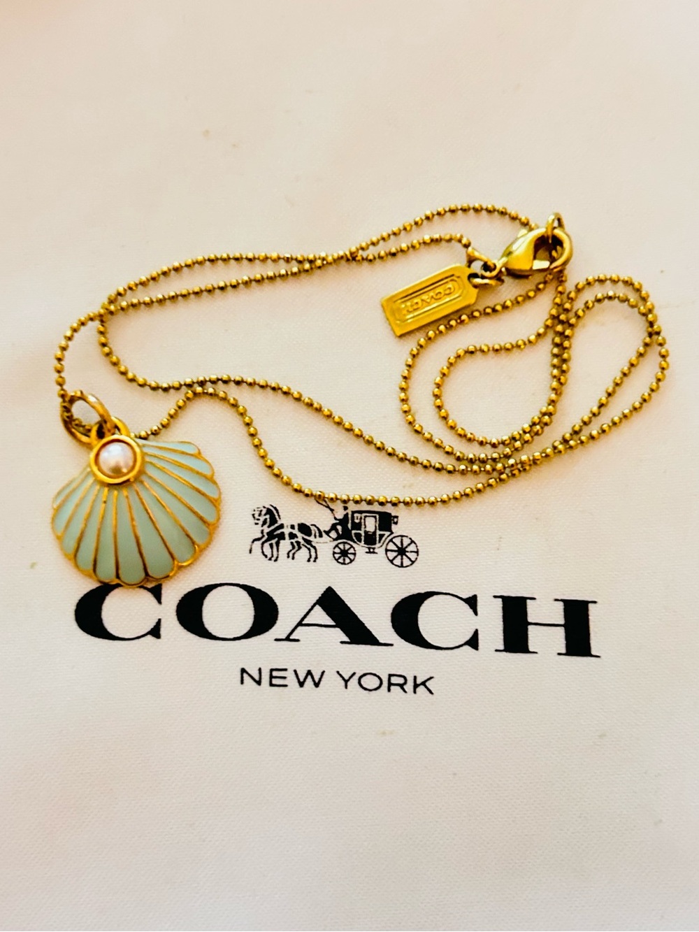 Coach Shell and Pearl Charm Necklace